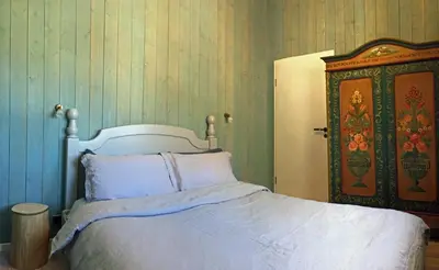 Ein Bett oder Betten in einem Zimmer der Unterkunft Chalet 12 Cerfs