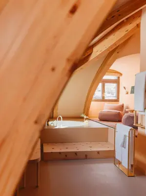 Ein Bett oder Betten in einem Zimmer der Unterkunft BEAUSiTE Zermatt
