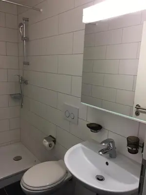 Ein Badezimmer in der Unterkunft Family friendly Apartment in the heart of Interlaken