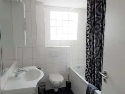 Ein Badezimmer in der Unterkunft Family friendly Apartment in the heart of Interlaken