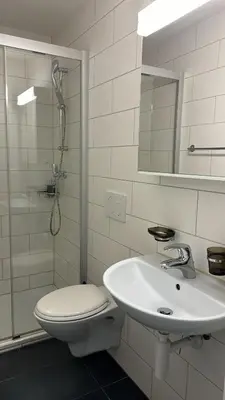 Ein Badezimmer in der Unterkunft Family friendly Apartment in the heart of Interlaken
