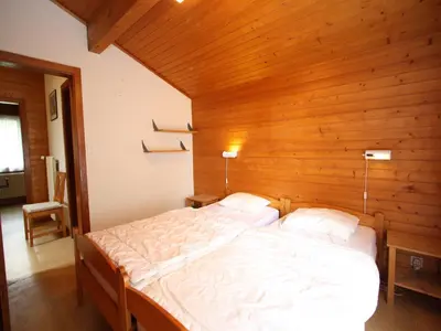 Ein Bett oder Betten in einem Zimmer der Unterkunft Bright Chalet with Terrace