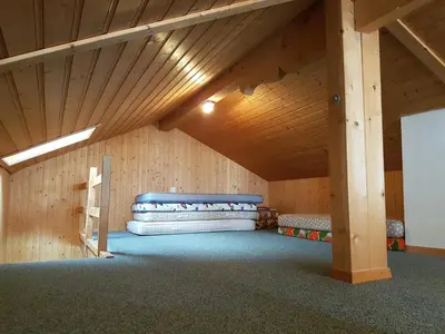 Ein Bett oder Betten in einem Zimmer der Unterkunft Chalet mit Alpenambiente Axalp
