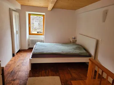 Ein Bett oder Betten in einem Zimmer der Unterkunft Casa Antica Corte