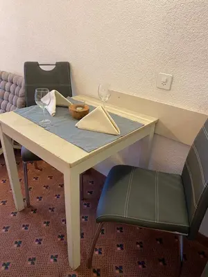 Ein Sitzbereich in der Unterkunft St Martin Apartments