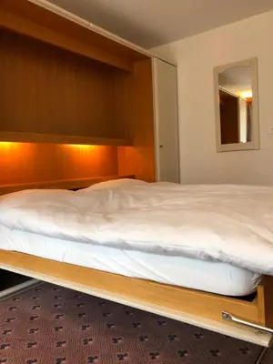 Ein Bett oder Betten in einem Zimmer der Unterkunft St Martin Apartments