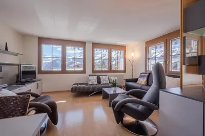 Ein Sitzbereich in der Unterkunft Chalet Alpenrebe