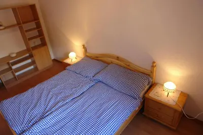 Ein Bett oder Betten in einem Zimmer der Unterkunft Myzermatt Monazit