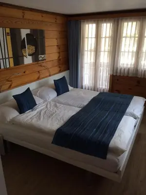 Ein Bett oder Betten in einem Zimmer der Unterkunft Mazot Zermatt