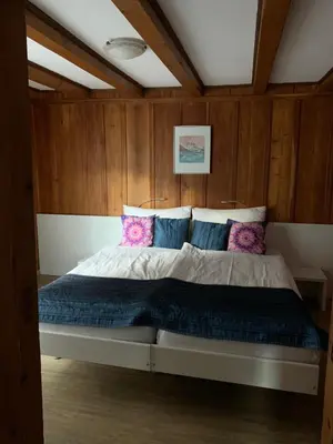 Ein Bett oder Betten in einem Zimmer der Unterkunft Mazot Zermatt