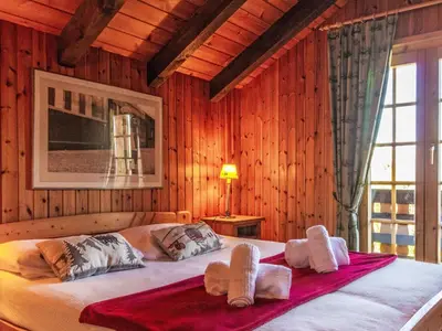 Ein Bett oder Betten in einem Zimmer der Unterkunft Chalet Mirabeau 8 by Interhome