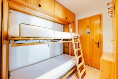 Ein Bett oder Betten in einem Zimmer der Unterkunft Cosy Centered with Garden and View in Veysonnaz