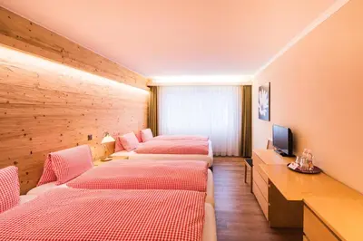 Ein Bett oder Betten in einem Zimmer der Unterkunft Hotel Weisses Kreuz