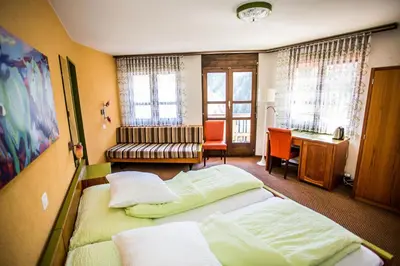 Ein Bett oder Betten in einem Zimmer der Unterkunft Hotel Derby