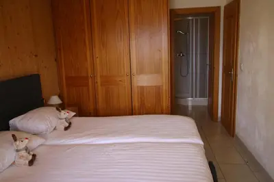 Ein Bett oder Betten in einem Zimmer der Unterkunft Christoph STANDING & CALM chalet 10 pers by Alpvision Résidences