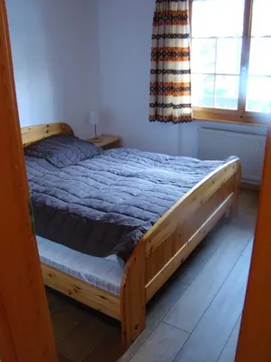 Ein Bett oder Betten in einem Zimmer der Unterkunft Chalet Sandrine