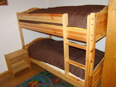 Ein Bett oder Betten in einem Zimmer der Unterkunft Chalet Sandrine