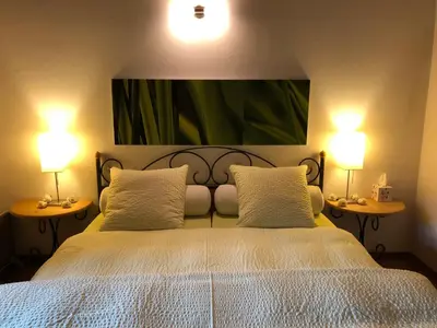Ein Bett oder Betten in einem Zimmer der Unterkunft Pensione Boschetto