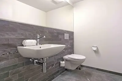 Ein Badezimmer in der Unterkunft Apartment JungfrauCenter Roteflue - GRIWA RENT