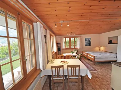 Ein Bett oder Betten in einem Zimmer der Unterkunft Apartment Chalet Bodenweg by Interhome