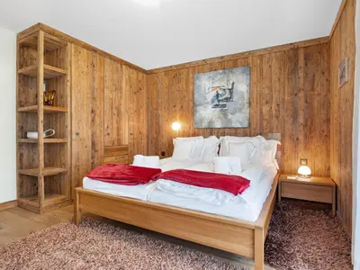 Ein Bett oder Betten in einem Zimmer der Unterkunft Apartment Rütschi-9 by Interhome