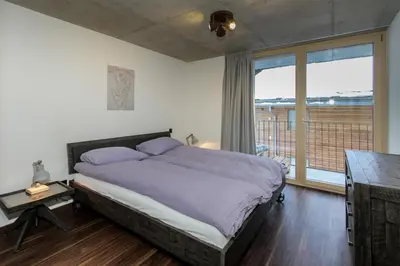 Ein Bett oder Betten in einem Zimmer der Unterkunft House Mojo