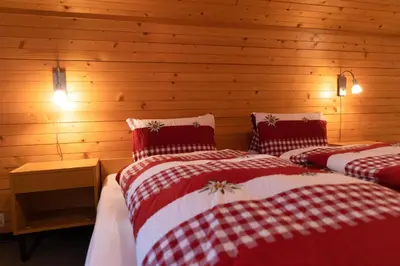 Ein Bett oder Betten in einem Zimmer der Unterkunft Apartments Saasunia