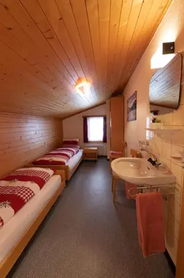Ein Bett oder Betten in einem Zimmer der Unterkunft Apartments Saasunia
