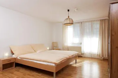 Ein Bett oder Betten in einem Zimmer der Unterkunft Ferienwohnung Bahnhöfli