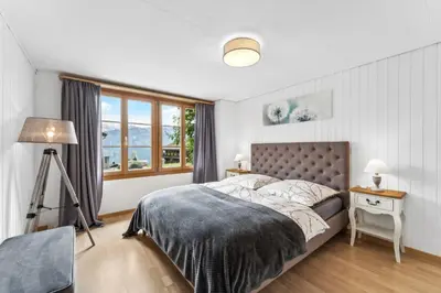 Ein Bett oder Betten in einem Zimmer der Unterkunft App. Seeblick Top of Interlaken