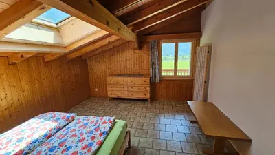 Ein Bett oder Betten in einem Zimmer der Unterkunft Apartment in Brienz