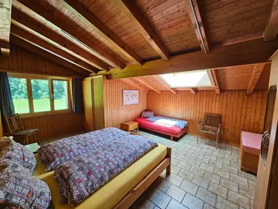 Ein Bett oder Betten in einem Zimmer der Unterkunft Apartment in Brienz