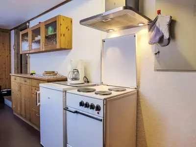 Küche/Küchenzeile in der Unterkunft Apartment Chalet Chilchboden by Interhome