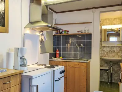 Küche/Küchenzeile in der Unterkunft Apartment Chalet Chilchboden by Interhome