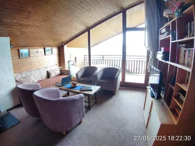 Ein Sitzbereich in der Unterkunft Apartment in Anzère