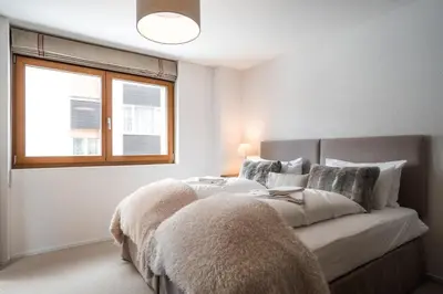Ein Bett oder Betten in einem Zimmer der Unterkunft Sonnegg Lodge 2.1
