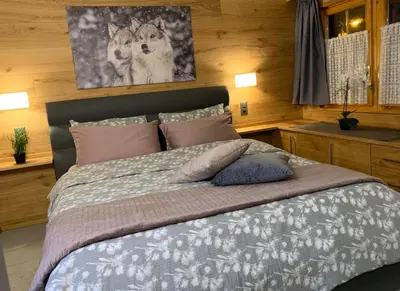 Ein Bett oder Betten in einem Zimmer der Unterkunft Kirchplatz Apartment Lupus & Cervus