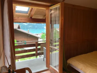 Ein Bett oder Betten in einem Zimmer der Unterkunft Bellerive - Partial lake view