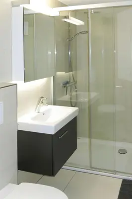 Ein Badezimmer in der Unterkunft Apartment Chalet Desirée by Interhome