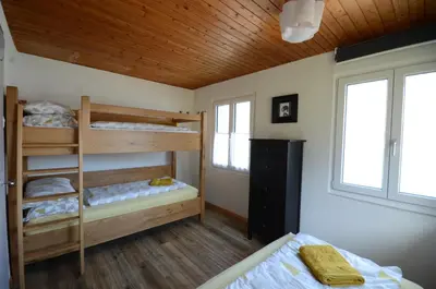 Ein Bett oder Betten in einem Zimmer der Unterkunft Lake House