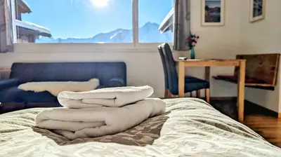 Ein Bett oder Betten in einem Zimmer der Unterkunft Imhof Alpine B&B Apartments