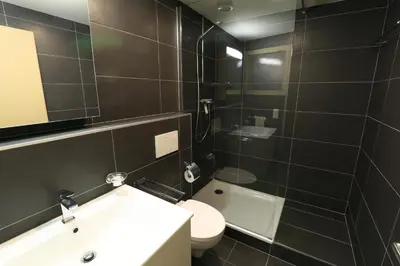 Ein Badezimmer in der Unterkunft Le Clavan