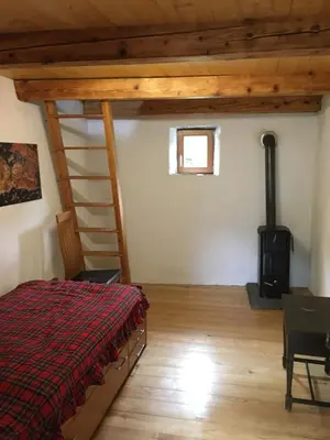 Ein Bett oder Betten in einem Zimmer der Unterkunft Rustico Ca d'Damunt