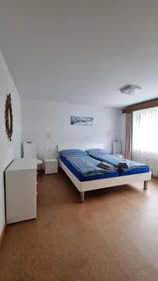 Ein Bett oder Betten in einem Zimmer der Unterkunft Haus Viktoria C