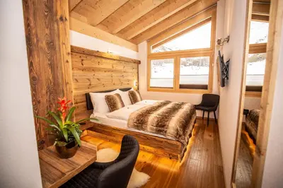 Ein Bett oder Betten in einem Zimmer der Unterkunft Palace Luxury Wellness Apartment and Boutique Hotel Ski-in-out