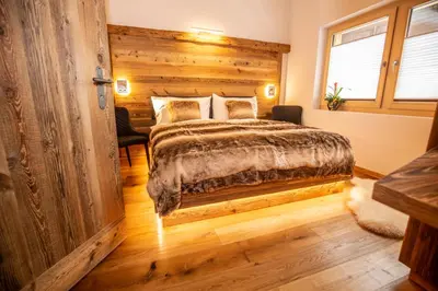 Ein Bett oder Betten in einem Zimmer der Unterkunft Palace Luxury Wellness Apartment and Boutique Hotel Ski-in-out