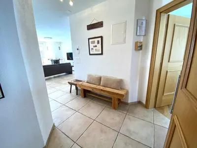 Ein Sitzbereich in der Unterkunft Residence Golf C 21