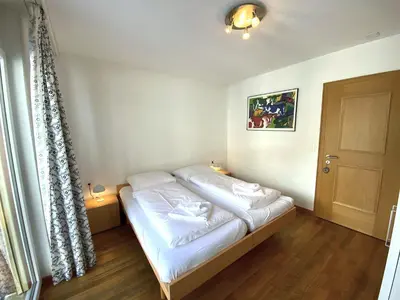 Ein Bett oder Betten in einem Zimmer der Unterkunft Residence Golf C 21