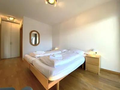 Ein Bett oder Betten in einem Zimmer der Unterkunft Residence Golf C 21