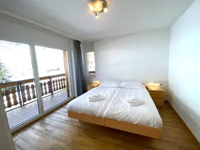 Ein Bett oder Betten in einem Zimmer der Unterkunft Residence Golf C 21